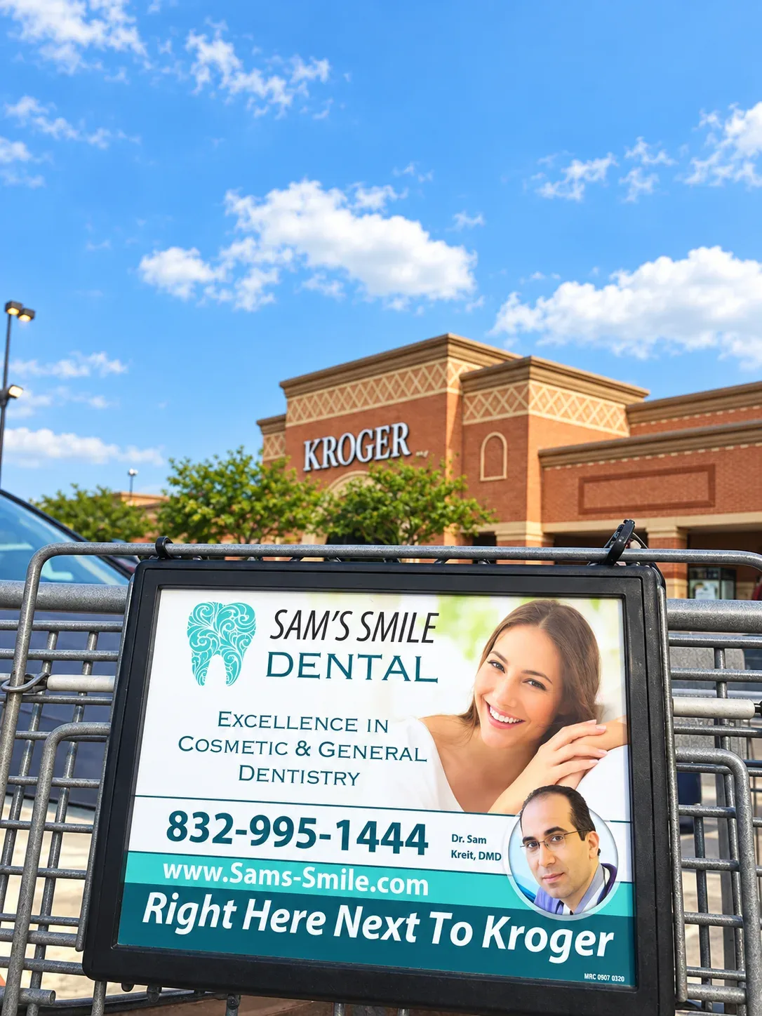 Sam’s Smile Dental billboard by the Kroger next door